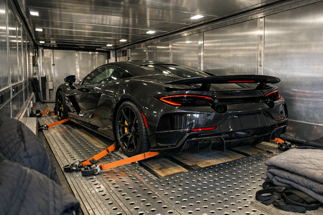 Enclosed car transport trailer for luxury vehicles